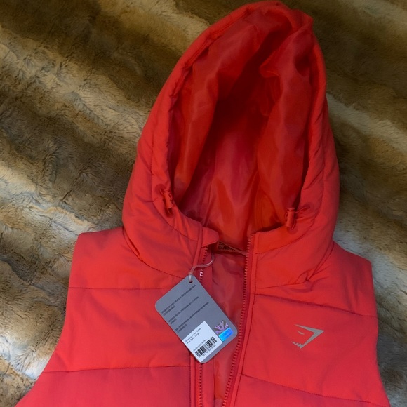 Gymshark Primary Puffer Gilet Vest - Redish/orange large - Picture 2 of 3